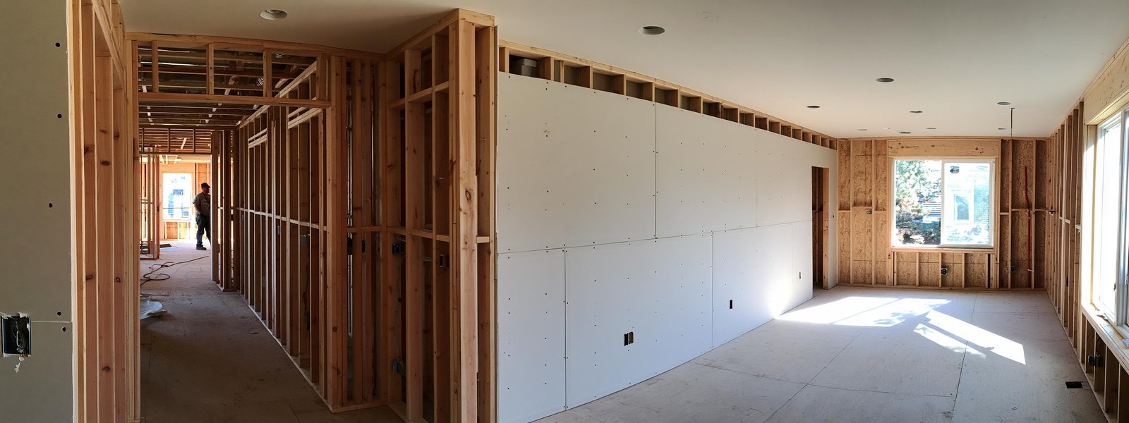New drywall hung on open framing in a Colorado Springs home